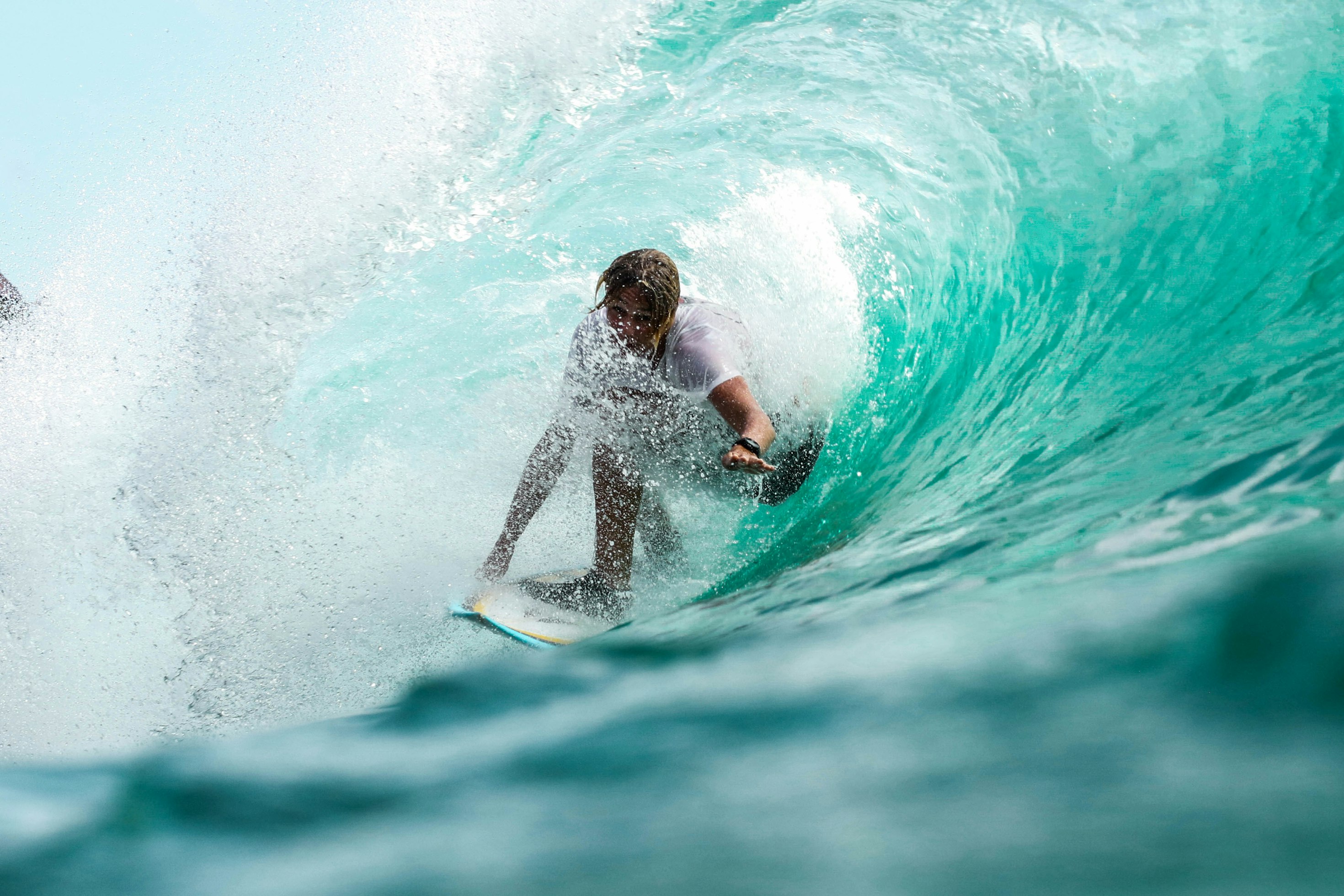 Surfer riding perfect barrel wave in Morocco
